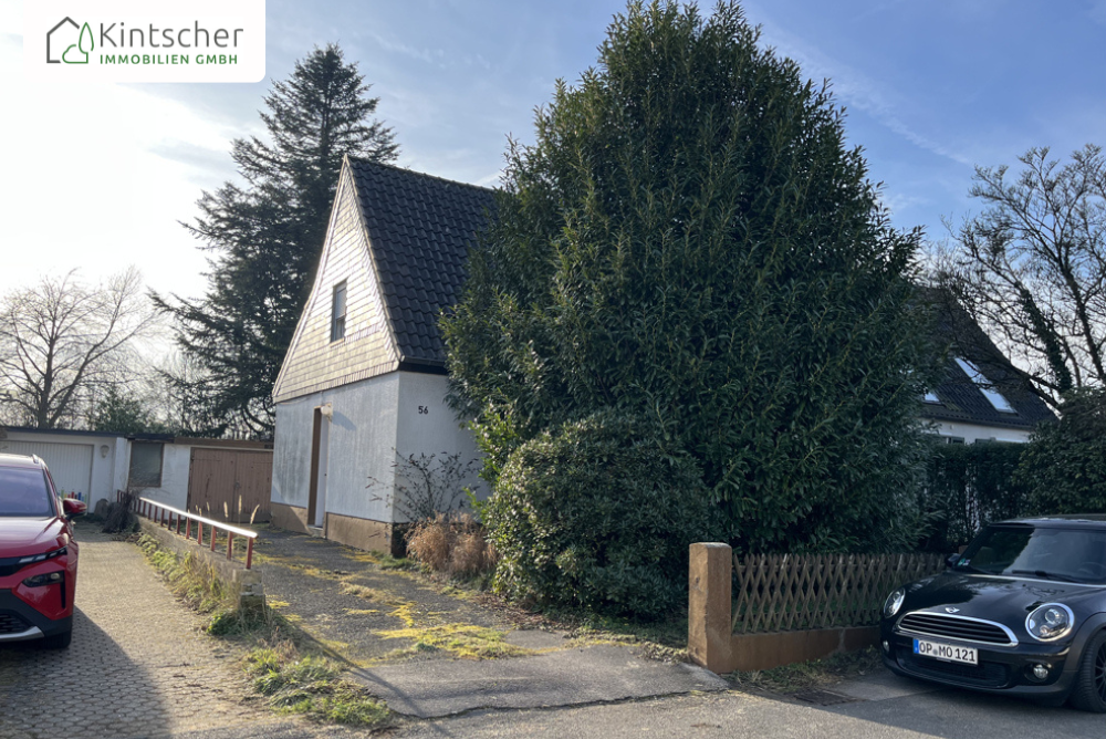 Titelbild der Immobilie Einfamilienhaus mit Garten und Garagen in Burscheid-Kaltenherberg